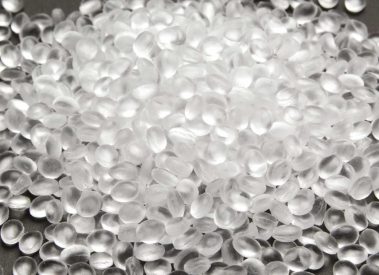 Transparent Polyethylene granules on dark .HDPE Plastic pellets.  Plastic Raw material . IDPE.